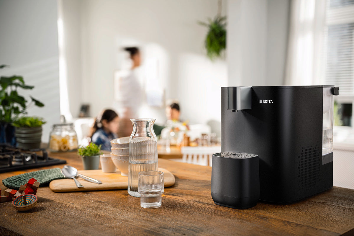 Load video: Water dispenser for hot and cold water shown from multiple angles