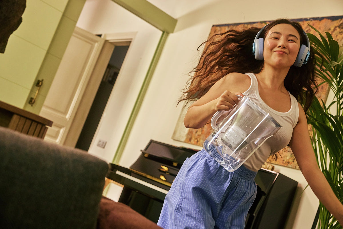 Load video: Water filter jug with modern design shown from multiple angles